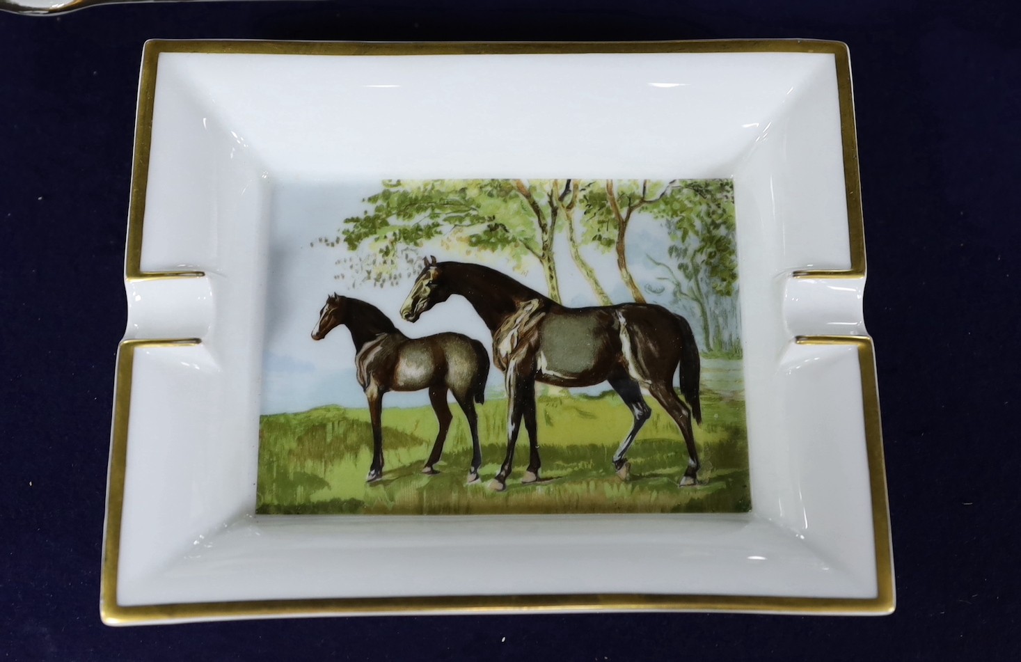 A Hermes 'horses' ashtray and other similar porcelain ashtrays, including Limoges, Hermes ashtray: 19cms wide